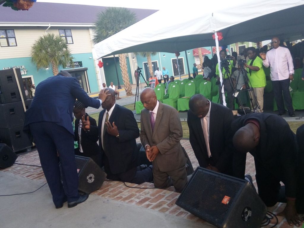 The Virgin Islands Party cabinet kneel while receiving prayers and blessings during the Praise and Thanksgiving Service on March 6 at the Cyril B. Romney Pier Park