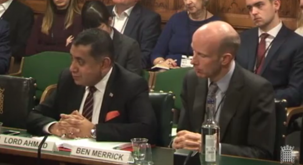 Lord Tariq Ahmad, minister of state for the Commonwealth and United Nations at the Foreign and Commonwealth Office, and Ben Merrick, director of overseas territories at the FCO, speak to the House of Commons’ Foreign Affairs Committee in December during its probe into the United Kingdom’s relationship with the overseas territories.